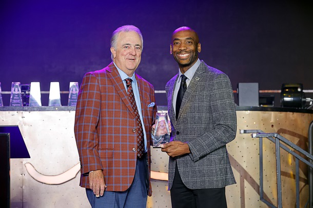 Honoree Don Logan, left, president/COO of the Las Vegas Aviators, poses with Michael Crome, senior vice president and CFO for the Las Vegas Raiders, during the C-Suite Honors event in the Zouk Nightclub at Resorts World Wednesday, Feb. 25, 2026. Crome served as emcee for the event.