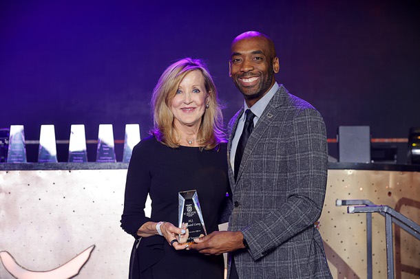 Honoree M.J. Maynard-Carey, left, CEO of the Regional Transportation Commission of Southern Nevada, poses with Michael Crome, senior vice president and CFO for the Las Vegas Raiders, during the C-Suite Honors event in the Zouk Nightclub at Resorts World Wednesday, Feb. 25, 2026. Crome served as emcee for the event.