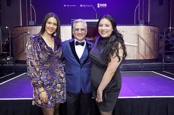 Honoree Scott Rosenzweig, center, president/CEO of Make A Wish Nevada, poses with friends during the C-Suite Honors event in the Zouk Nightclub at Resorts World Wednesday, Feb. 25, 2026.