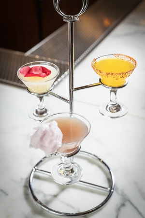 Minitini cocktail tower with The Showgirl, Lychee Me and Skyy High cocktails