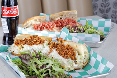 The Chicken Caesar Salad sandwich, foreground, and the Beef sandwich at the Golden Boy Market & Deli, 10960 S. Eastern Ave., Thursday, March 26, 2026, in Henderson. STEVE MARCUS