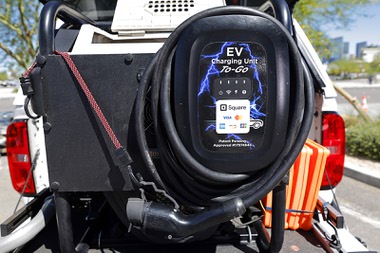A mobile electric vehicle charging unit is displayed during an Electric Vegas Recycle & Ride event at Allegiant Stadium Saturday, April 4, 2026. Local electric vehicle enthusiasts, auto dealerships, and environmental organizations participated in the&nbsp;event.