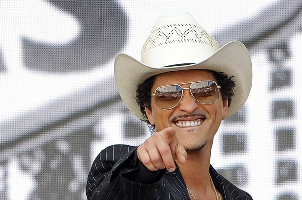 Entertainer Bruno Mars reacts to fans in Toshiba Plaza Friday, April 10, 2026, during “Bruno Mars Day” in Las Vegas.