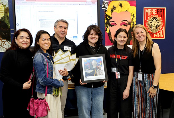 Las Vegas Weekly “Youth in Arts” cover winner runner-up Miranda Gates, center, poses with family, Las Vegas Weekly editor Shannon Miller, second left, and art teacher Jaime Giger, far right, during a presentation at Liberty High School in Henderson Tuesday, April 28, 2026. Family from left are: mother Bisa Gates, sister Emilia Gates, and father Jerry Gates.