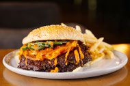 An In Limbo Burger with jalapeños and bacon and onion&nbsp;jam 