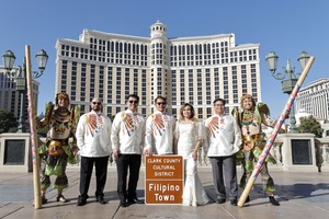 Filipino Town Las Vegas founders (from left) Philip Paleracio, Virgilio “Bing” Longakit, Ernie Buo, Jocelyn Borromeo and Ron Sumbang pose with  dancers on January 31.