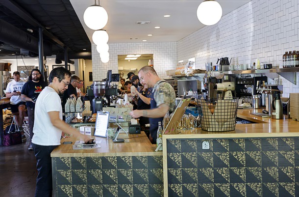 An interior view at Vesta Coffee Roasters, 1114 S. Casino Center Blvd., in the Arts District Friday, June 12, 2026. The sandwich originally started as a secret menu item. Bodega Sando - center-cut bacon, over medium egg hash browns, cheddar cheese and habanero ketchup on an in-house made brioche bunVanilla Cardamom LatteMont Blanc - cold brew with vanilla foam, fresh orange zest and grated nutmeg