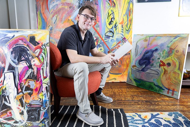 Artist Brian Gibson poses with artwork in his home in Las Vegas Wednesday, July 29, 2026.