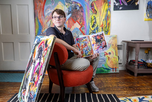 Artist Brian Gibson poses with artwork in his home in Las Vegas Wednesday, July 29, 2026.